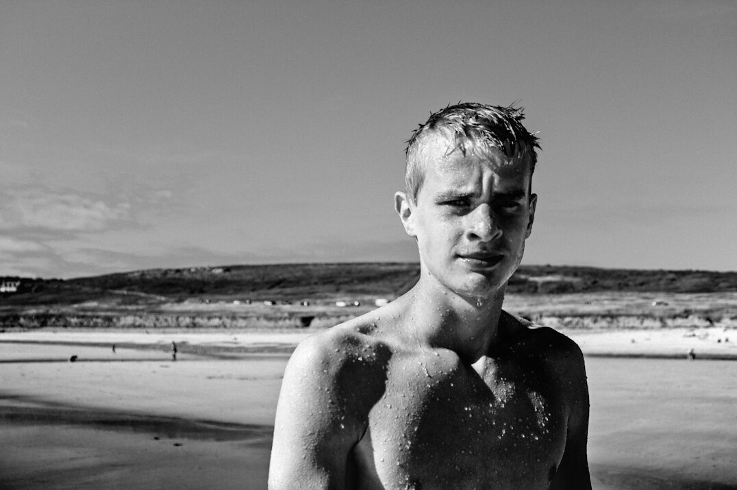 Portrait of a young man with short hair